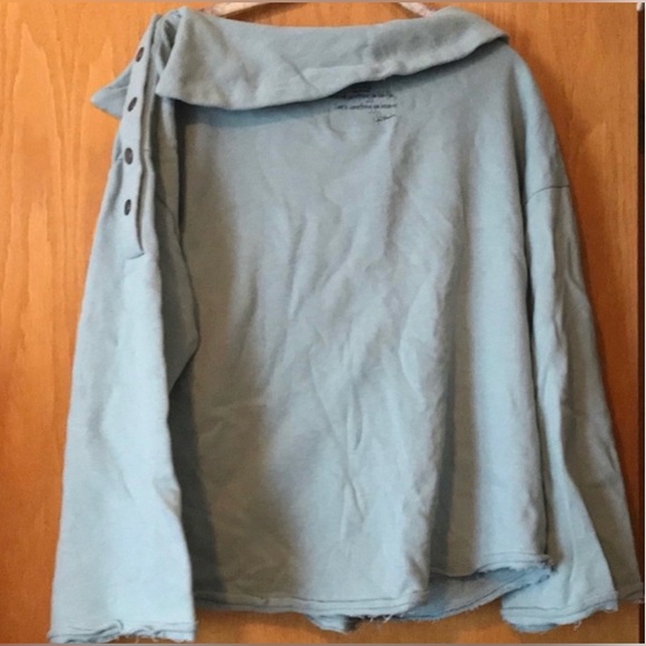 Peace Love World sweater is a size Medium. - Picture 5 of 7